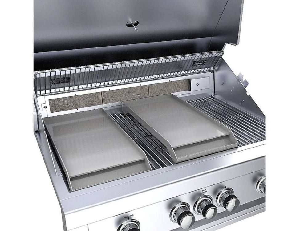 Two Sunstone stainless griddle inserts positioned inside a gas grill, demonstrating recessed placement alongside grill grates.