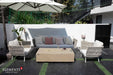 Functional detail of the Colorado sunlight yellow fire table used as an outdoor coffee table with the burner lid in place, styled with wine, glasses, and snacks.