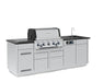 A front-left perspective view of the Broil King Imperial QS 590iE Smart Grill Island on a clean white background, highlighting the built-in grill, control dials, black countertop, side sink with faucet, and left-side cabinet details.