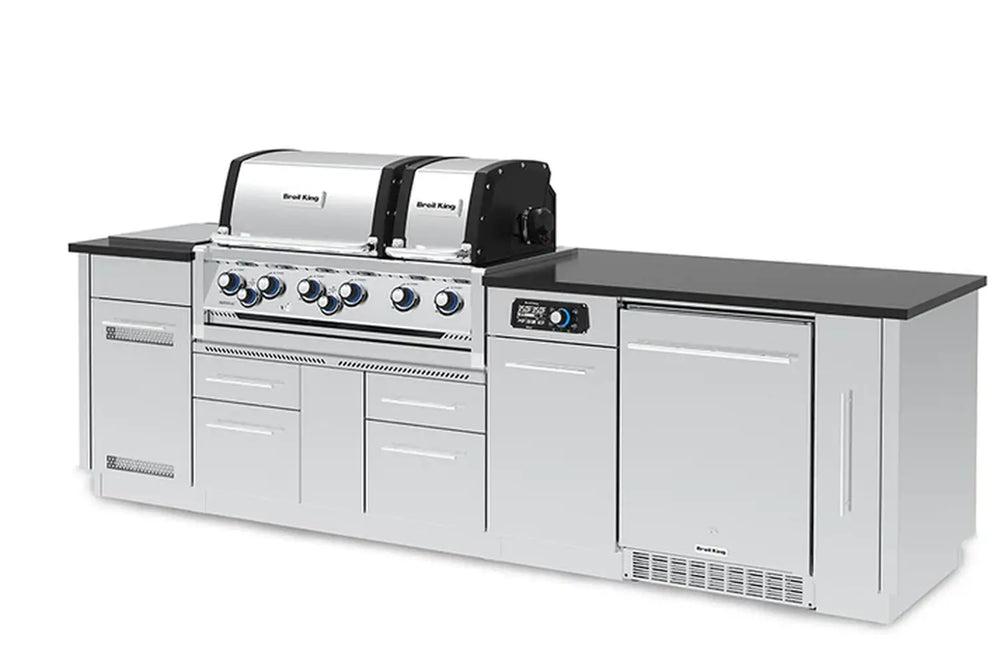 Right-side perspective of the Broil King Imperial QS 690iF Smart Grill Island showcasing the large black prep countertop and integrated smart grilling technology controls.