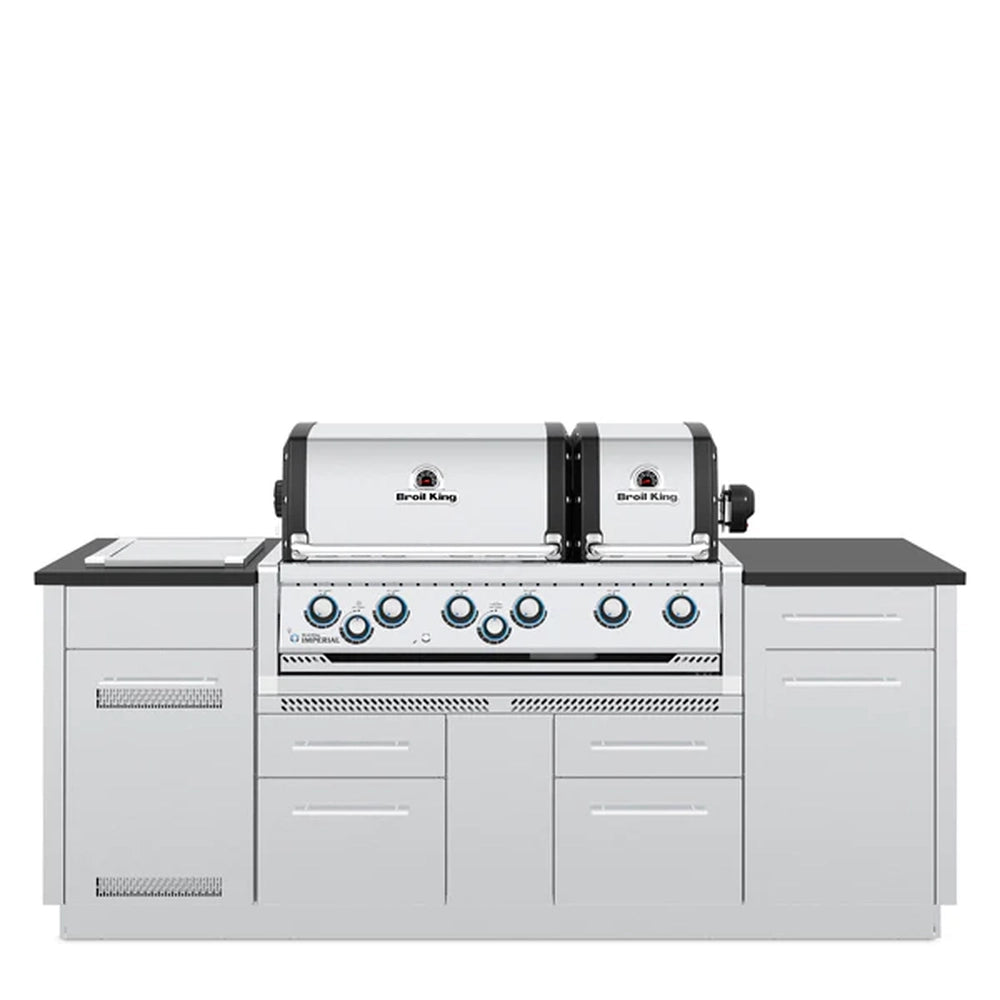 Broil King Imperial S 690ie Smart Grill Island with closed dual stainless steel hoods and cabinet doors, front view.