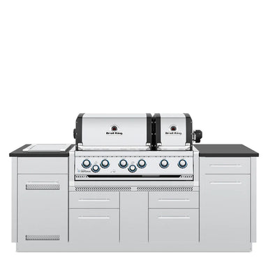 Broil King Imperial S 690ie Smart Grill Island with closed dual stainless steel hoods and cabinet doors, front view.