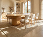 BBO Miya Japandi-style poker dining table in warm neutral interior with upholstered chairs