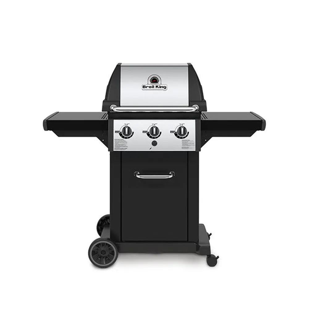 Broil King Monarch 320 freestanding gas grill, front view with three burner control knobs, stainless steel lid, black side shelves, and enclosed cart base