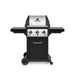 Broil King Monarch 320 freestanding gas grill, front view with three burner control knobs, stainless steel lid, black side shelves, and enclosed cart base