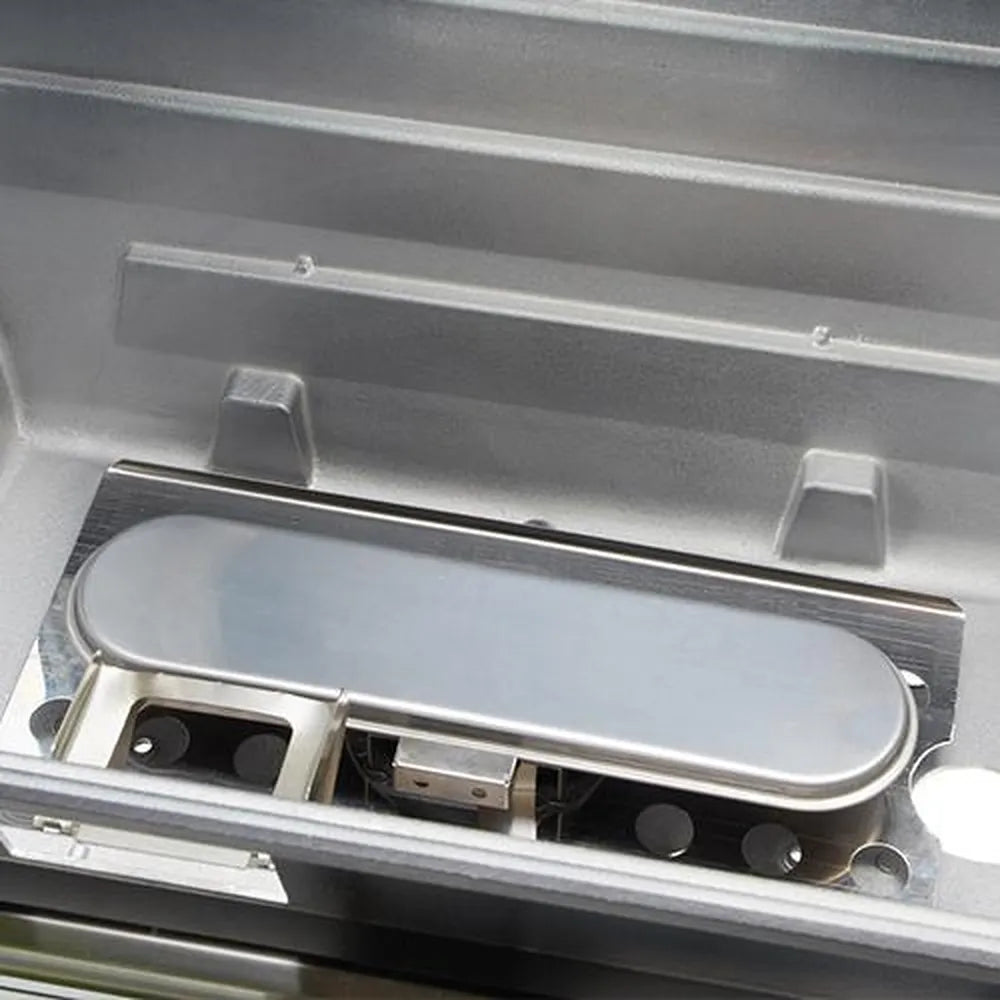 Close-up of the durable oval gas burner system installed in the Broilmaster 25 inch built-in grill firebox