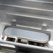 Close-up of the durable oval gas burner system installed in the Broilmaster 25 inch built-in grill firebox