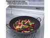Sunstone RUBY4B 36" grill with 15-inch round wok insert cooking vegetables on stainless steel grates