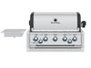Close-up of the Broil King Imperial S 590i built-in grill head with five burner control knobs, integrated side burner, and stainless steel hood.