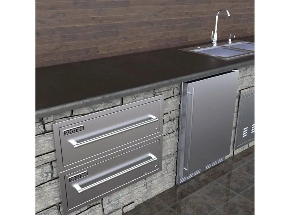 Sunstone 30-inch stainless warming drawer installed in outdoor kitchen island, electric 110V food warmer drawer by sink area.