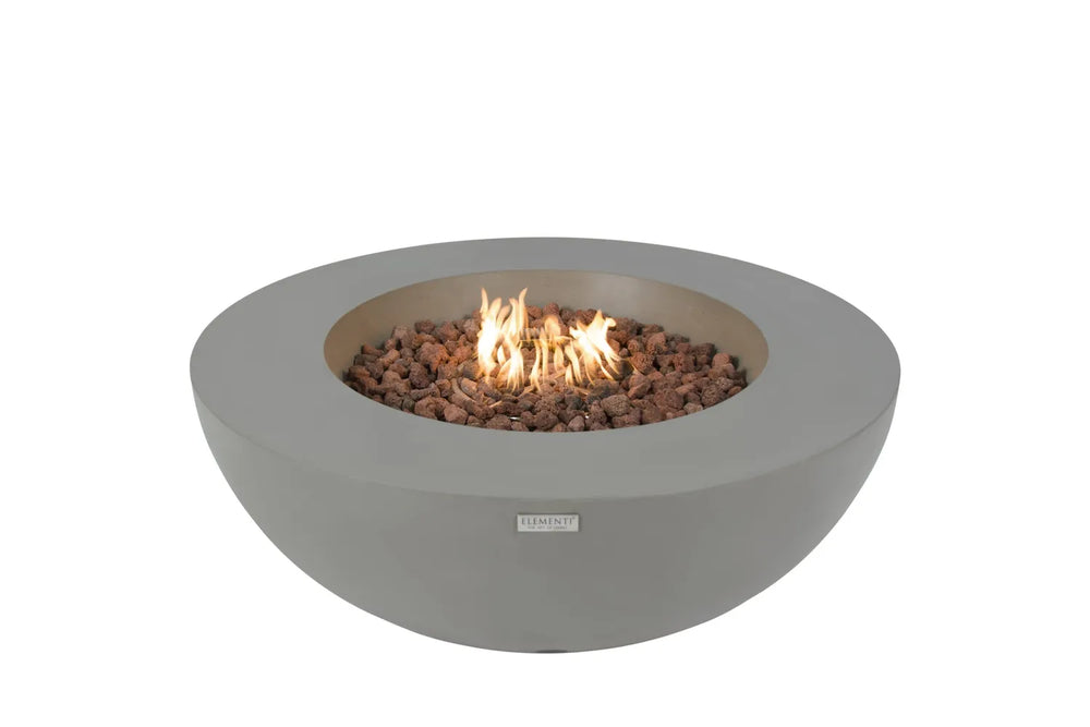 Elementi Lunar Bowl fire pit in gray concrete with orange flames and lava rocks on a white background.