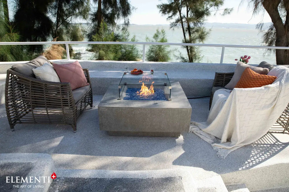 Elementi Plus Victoria fire table used as a patio coffee table.