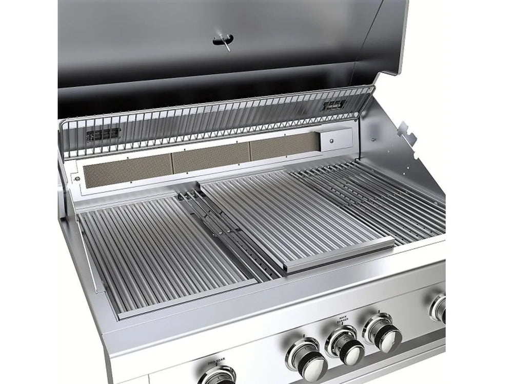 Sunstone 10" searing grate insert installed in a gas grill, shown in place among standard cooking grates.