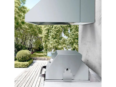 Summerset Outdoor Vent Hood installed above an outdoor kitchen grill on a patio.