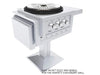 Stainless burner appliance mounted on a pedestal post with side “wings” attached; text reads “Add jacket post and wings for the perfect stationary grill.”