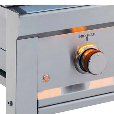Sunstone R-Light-SW grill light button for Ruby & Sunstone series, illuminated stainless control panel switch on grill face.
