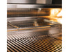 Close-up of warming rack with removable stainless steel tray under halogen lighting inside the True Flame grill.