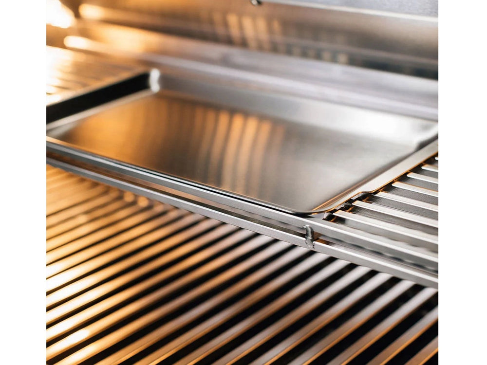 Close-up of stainless steel tray integrated into the upper warming rack of a True Flame grill.