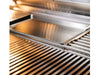 Close-up of stainless steel tray integrated into the upper warming rack of a True Flame grill.
