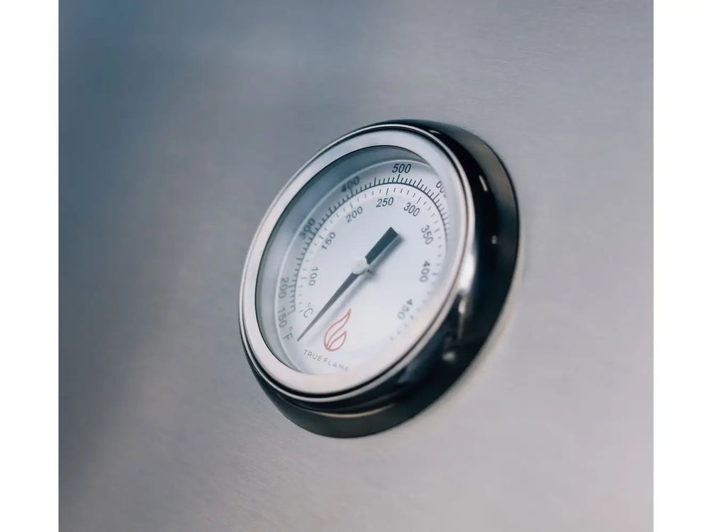 Close-up of the built-in hood thermometer on a True Flame grill, displaying temperature in Fahrenheit and Celsius.
