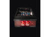 Perspective shot of True Flame wok burner ignited with strong blue flames beneath the circular wok grate.