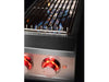 Side angle of True Flame burner in use with visible blue flame and glowing red control knobs.
