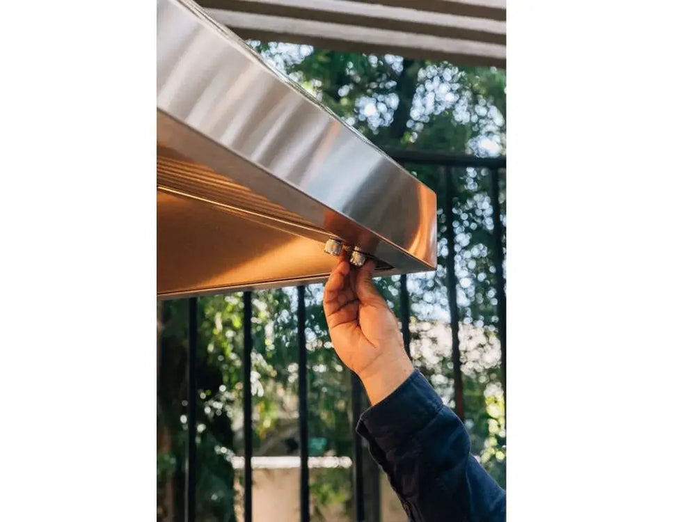 TrueFlame outdoor vent hood stainless steel light and knob operation close-up.