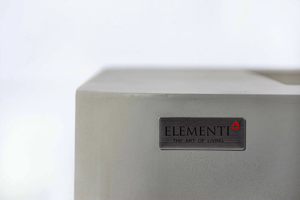 Elementi badge on light gray concrete-look fire table corner.