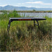 Blackstone Omni Stand set up outdoors in grassy field – ideal for tailgating, camping, and backyard cooking