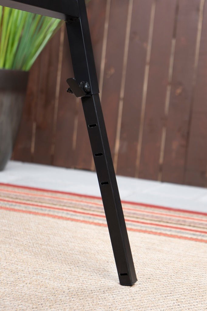 Adjustable locking legs of the Blackstone Omni Stand for secure height customization on uneven terrain