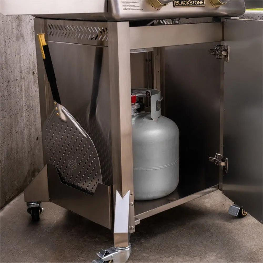 Rear exhaust view of portable pizza oven showing chimney ventilation and fuel acces